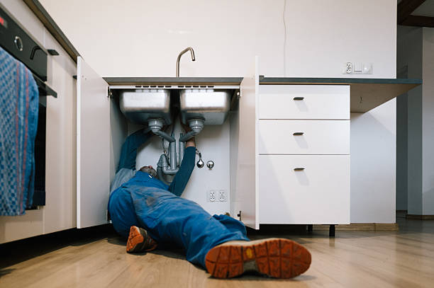 Professional Emergency Plumber technician working in Port Jefferson, NY